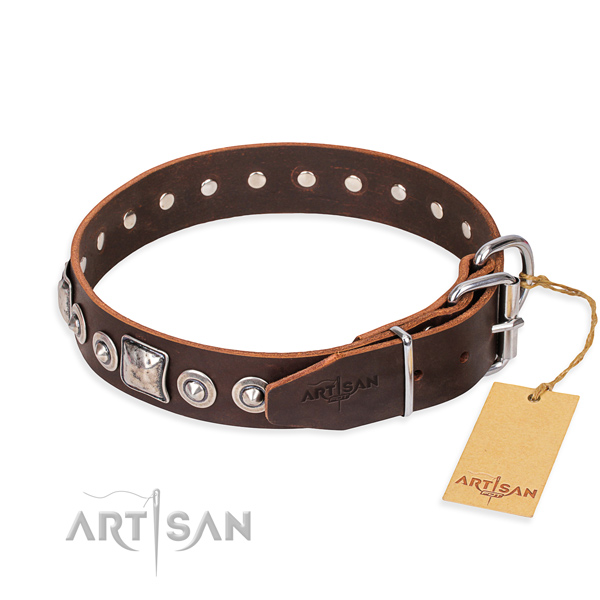 Leather dog collar made of soft to touch material with strong decorations